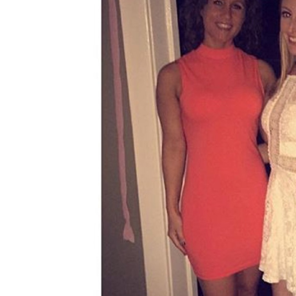 Orange body fitting dress